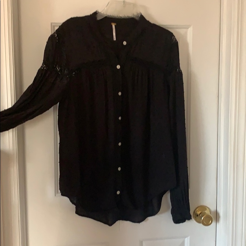 Lace detail button from blouse